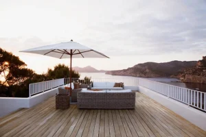 Modern coastal view with minimalist backyard deck and patio designs.